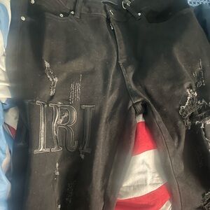 AMIRI Black Distressed Skinny Jeans